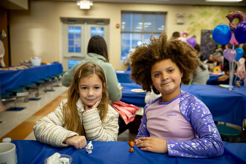 Students enjoy pastries with their parents